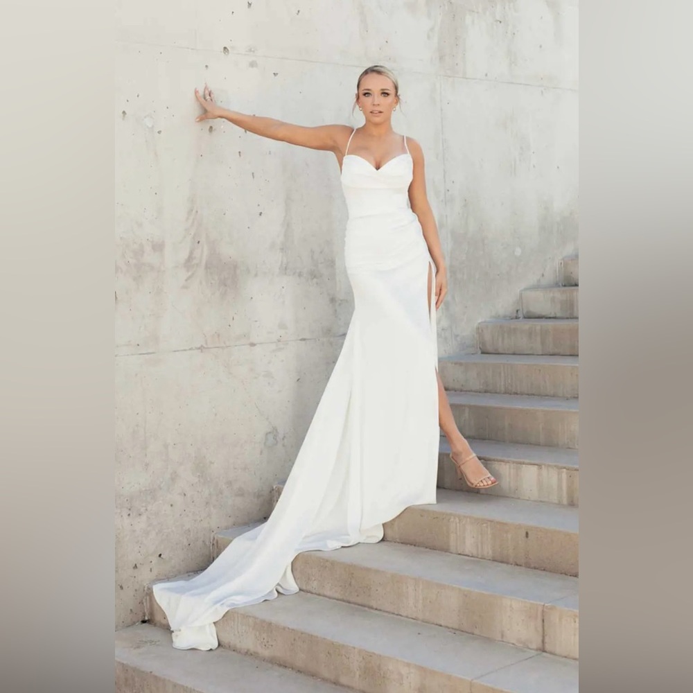 Martina Liana wedding gown, new still in bag, size 16 (street clothes 10/12.